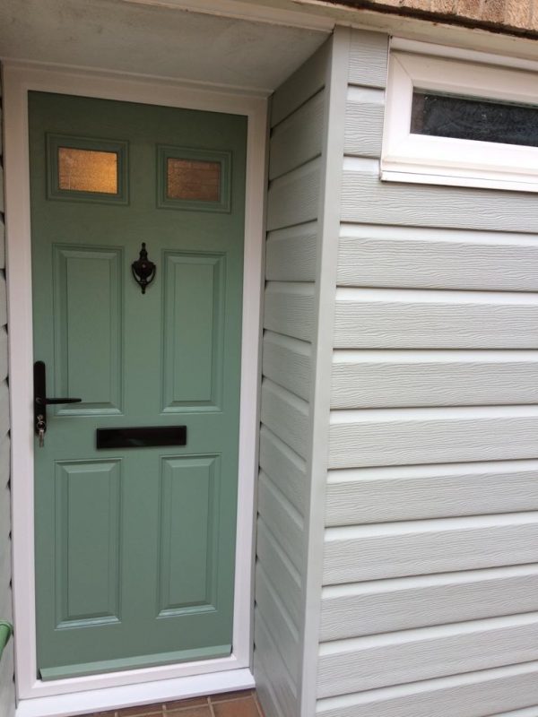 New front door and cladding in Godmanchester Apple Home Improvements